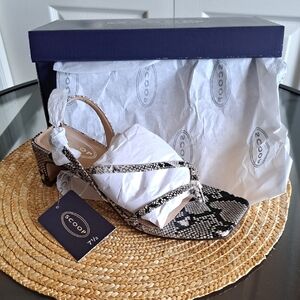 Elegant Black and White Sandals with Adjustable Straps
